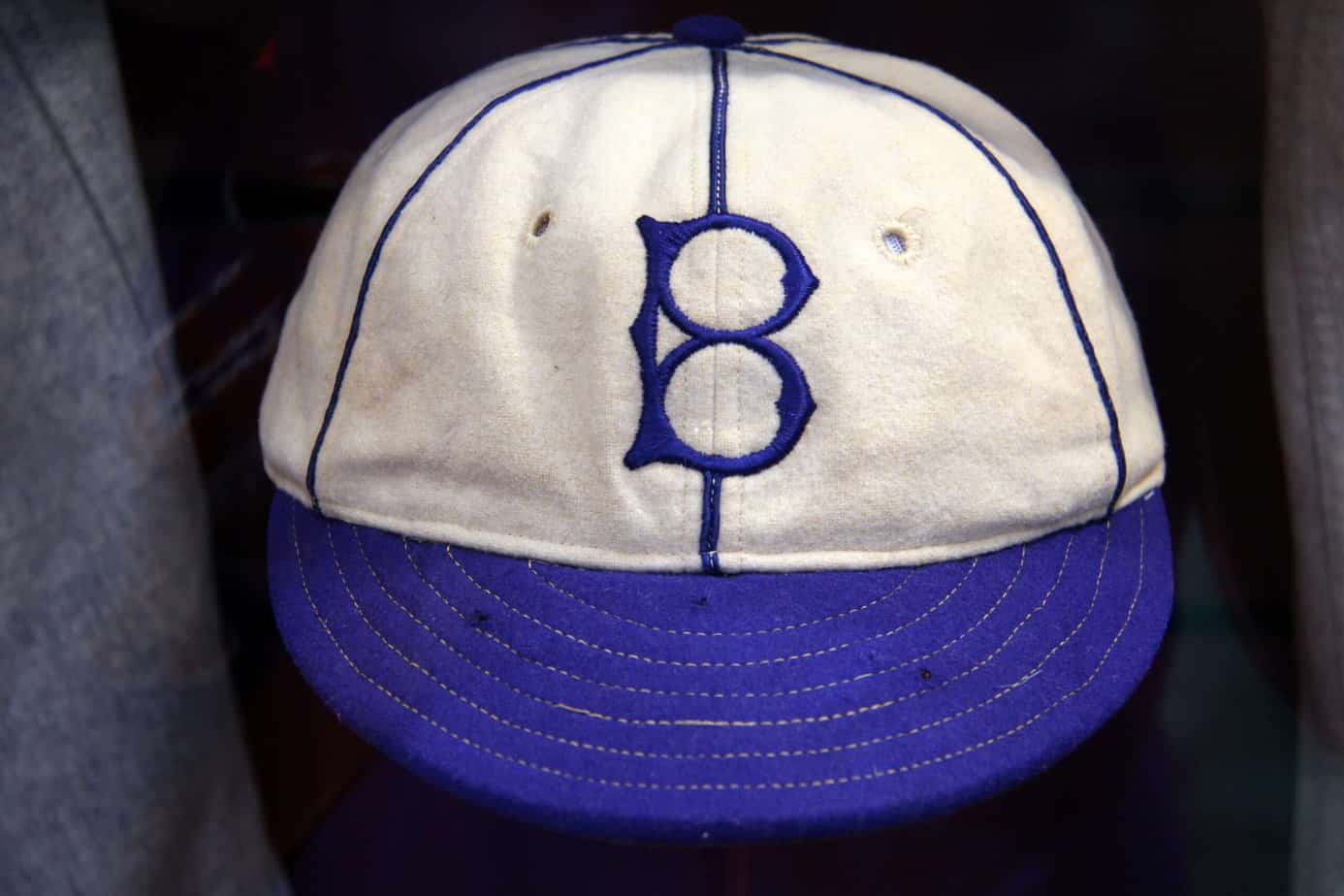 1955 Brooklyn Dodgers. I can't explain the LA caps, or the one from a  completely different franchise.