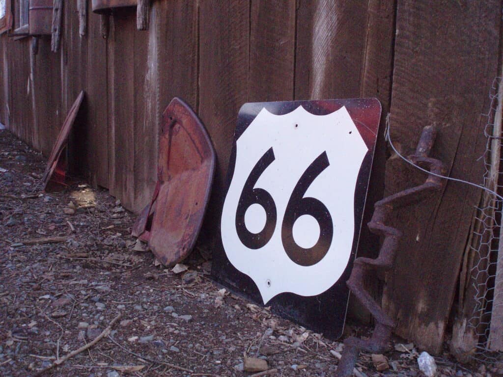 Route 66 shield in a junkyard